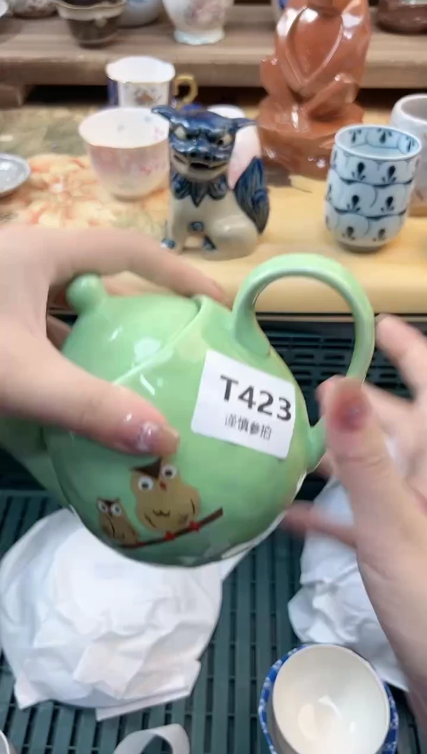 瓷片?**F 423