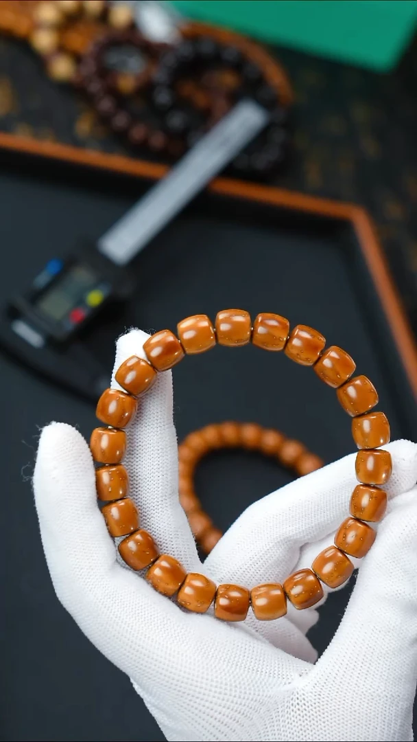 手串紫金鼠油核直切10+       10755