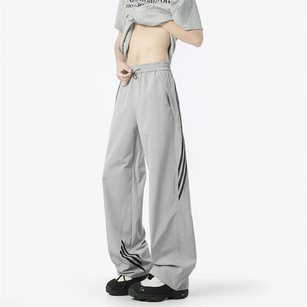 夏季新款薄款潮流速干轻薄透气冰丝裤宽松织带运动休闲裤男长裤