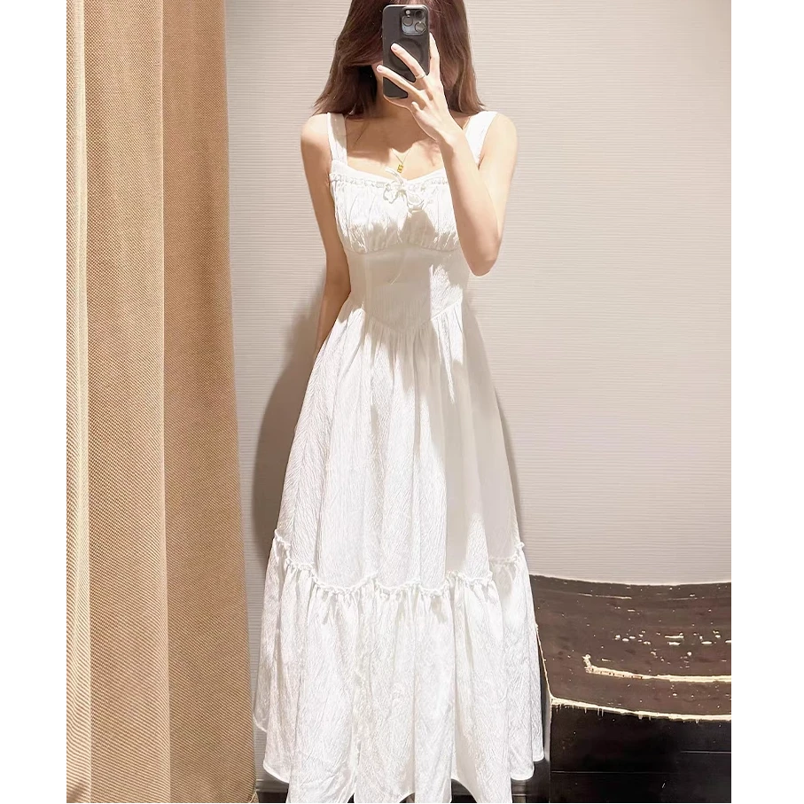F1029法式初恋甜美白色吊带连衣裙夏季2025新款海边度假收腰长裙