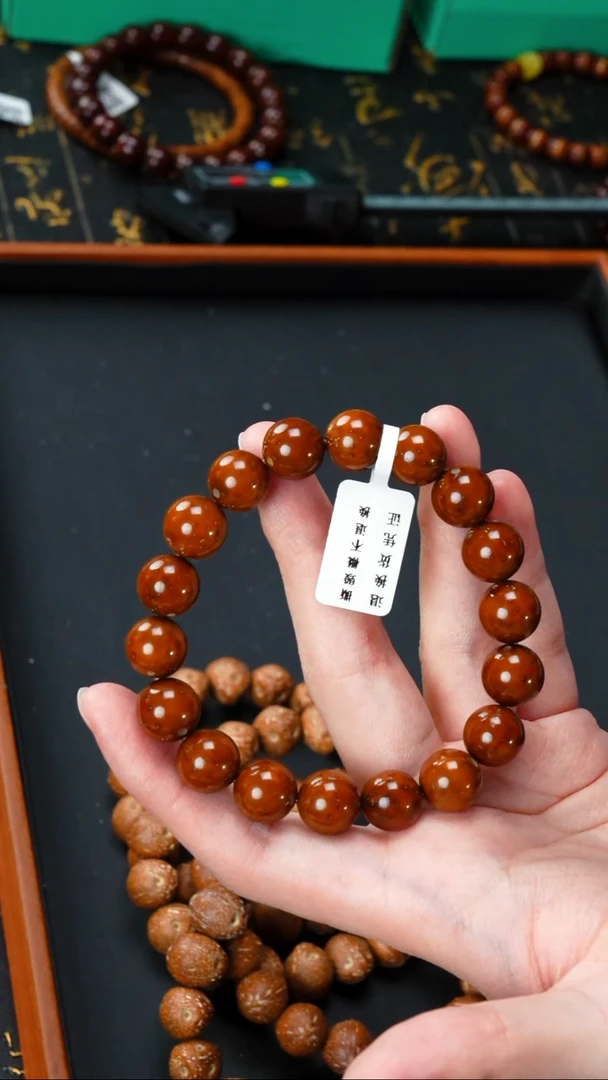 紫金鼠手串油核光珠12+     10692