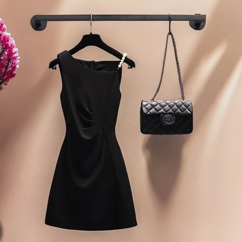 夏季潮牌修身收腰连衣裙女2025年新款设计感显瘦遮肚子包臀吊带裙