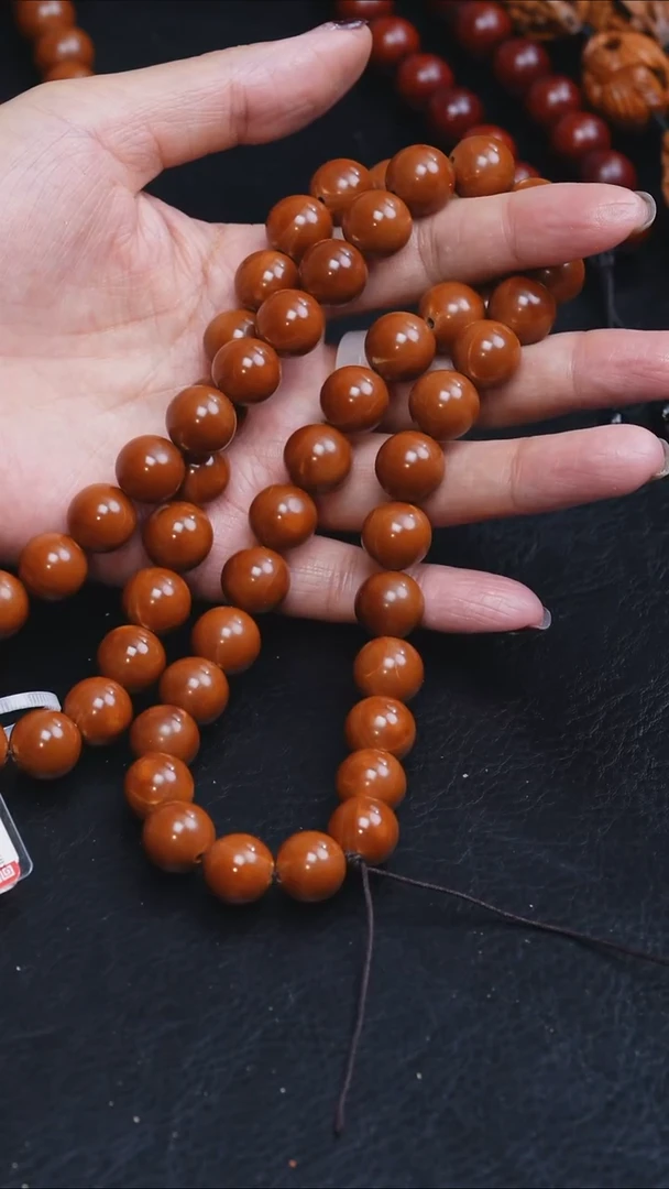 吊坠橄榄核渔****厅1.3正圆光珠54颗＋大悲咒＋描金