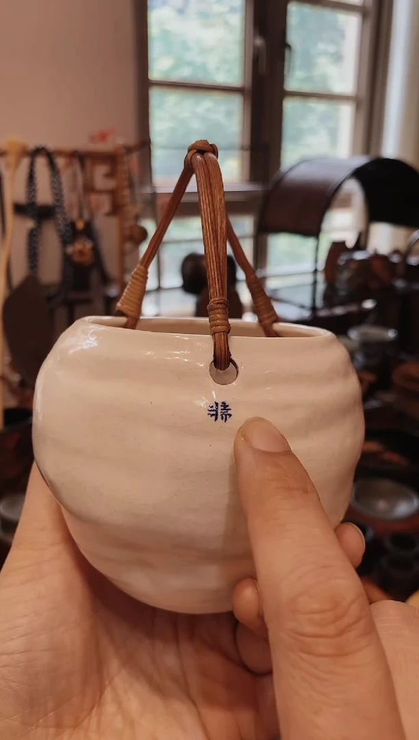 白斋提粱陶瓷公道杯