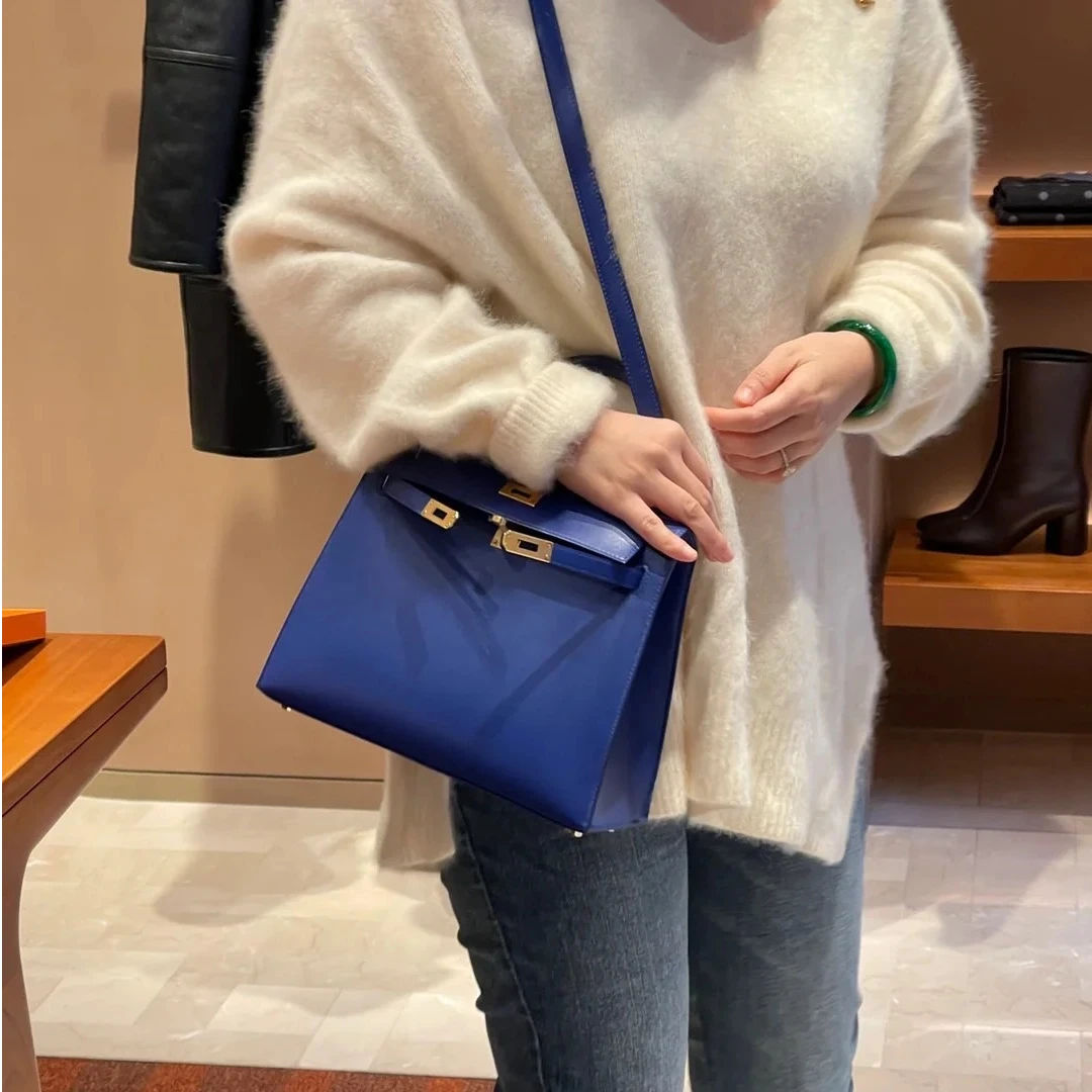 99新 Hermes/爱马仕 小花Jerry活动Kelly25蓝D刻 金扣包