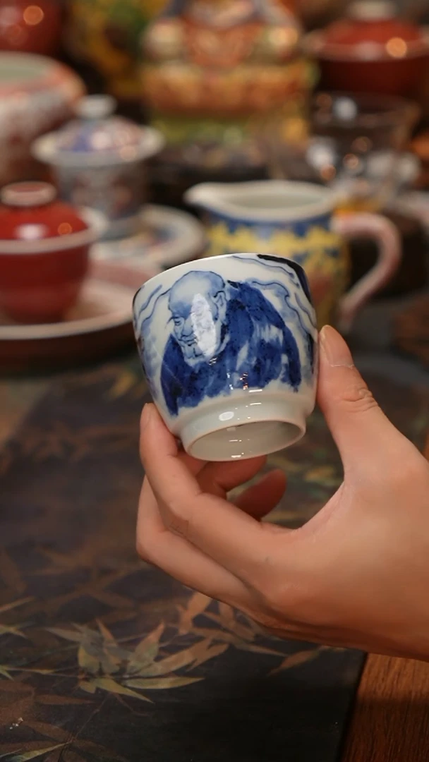 康亭守艺人物鼓腹杯