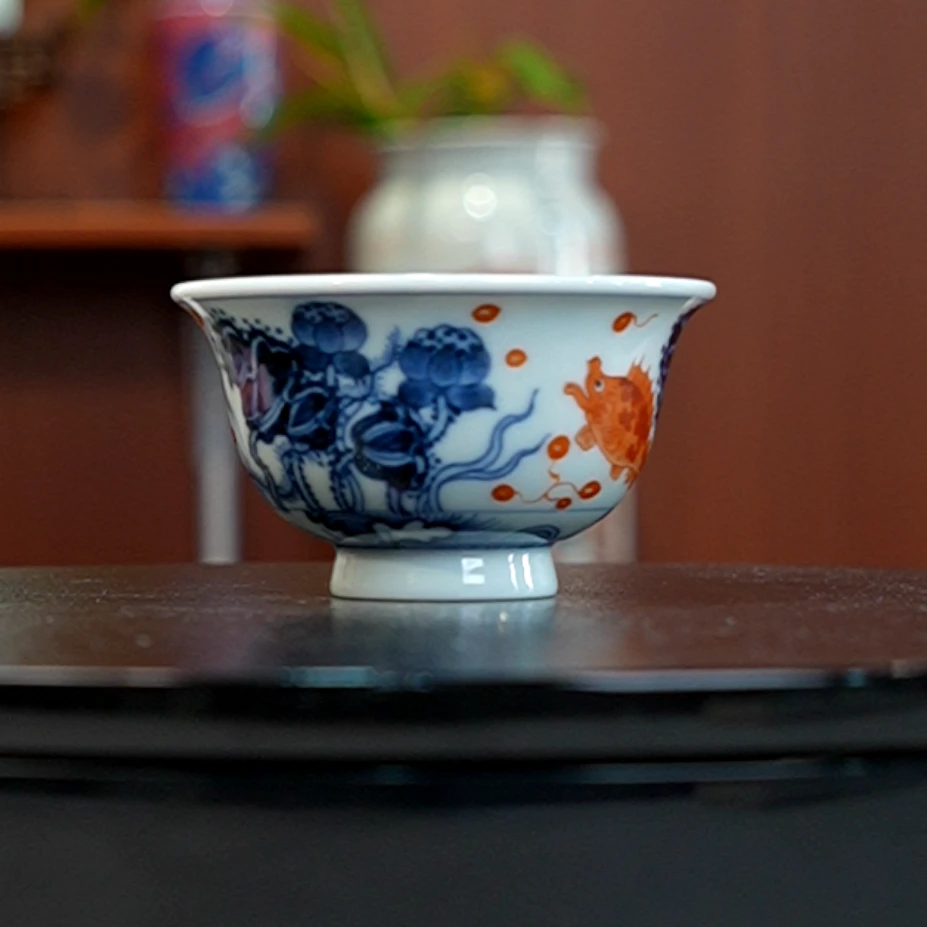 12.28/N100520/00873/初瑾窑/青花矾红鱼澡纹压手杯