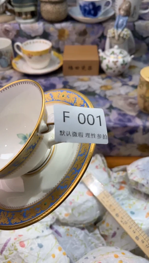 瓷片不****天F        001