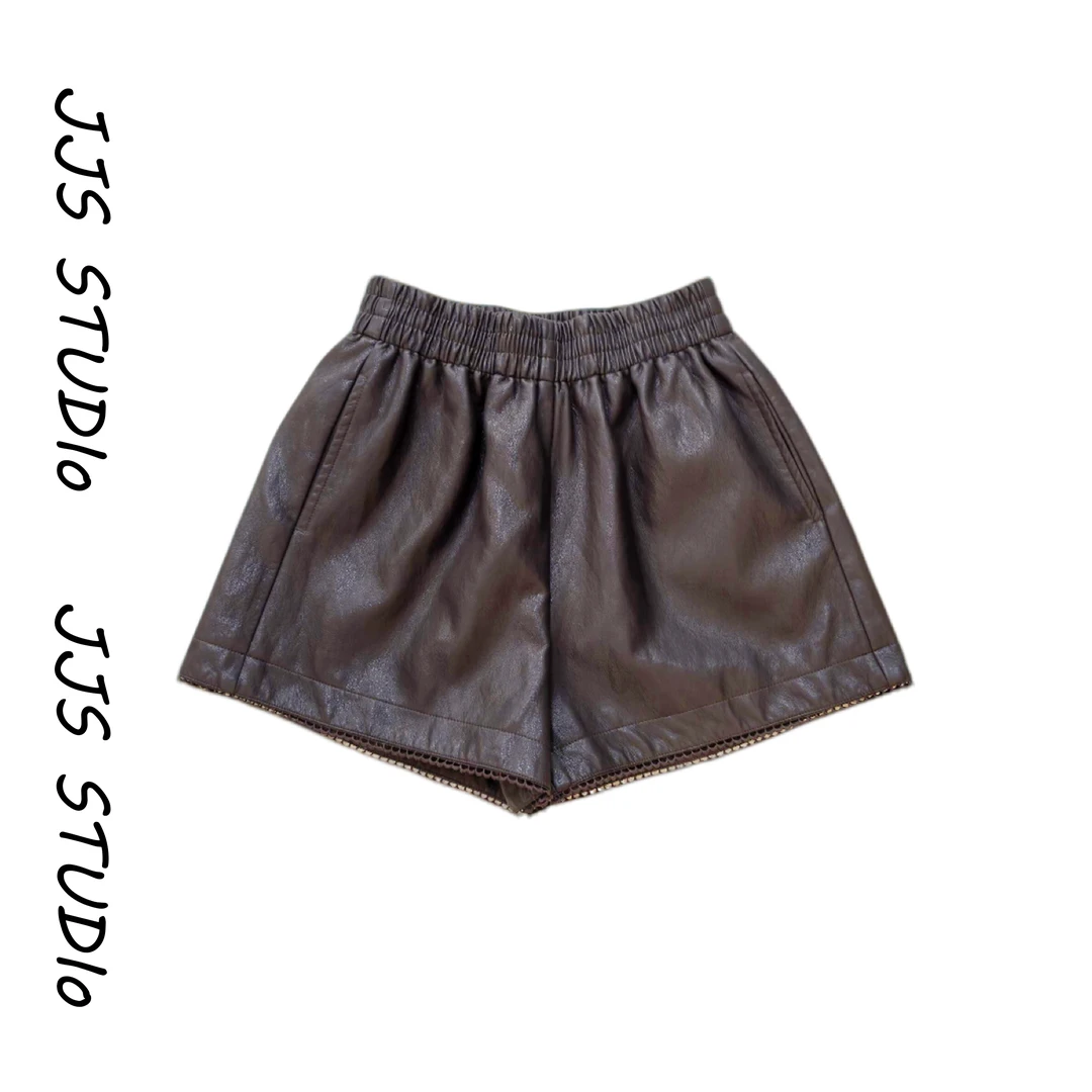 5090710『落叶吟』2025显瘦时尚百搭休闲个性设计感松紧腰短裤