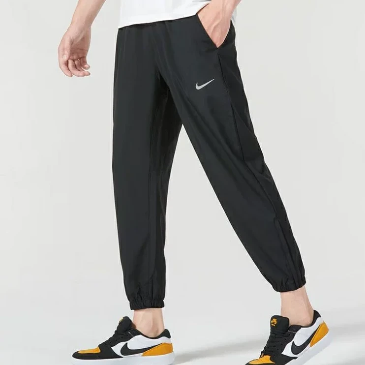 耐克/NIKE 【卖场同款】梭织运动裤速干透气男子运动长裤FB7498010