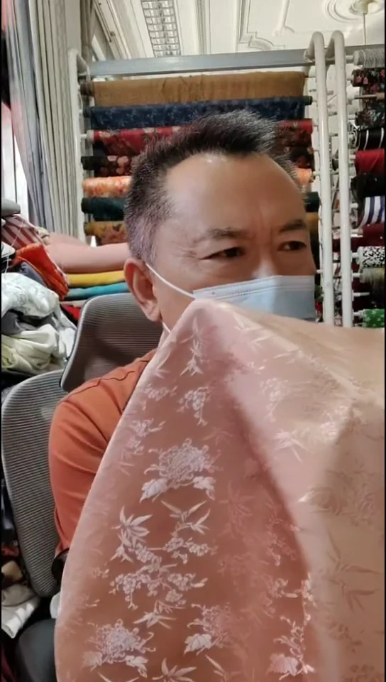 藕粉色纯色提花织锦缎布料