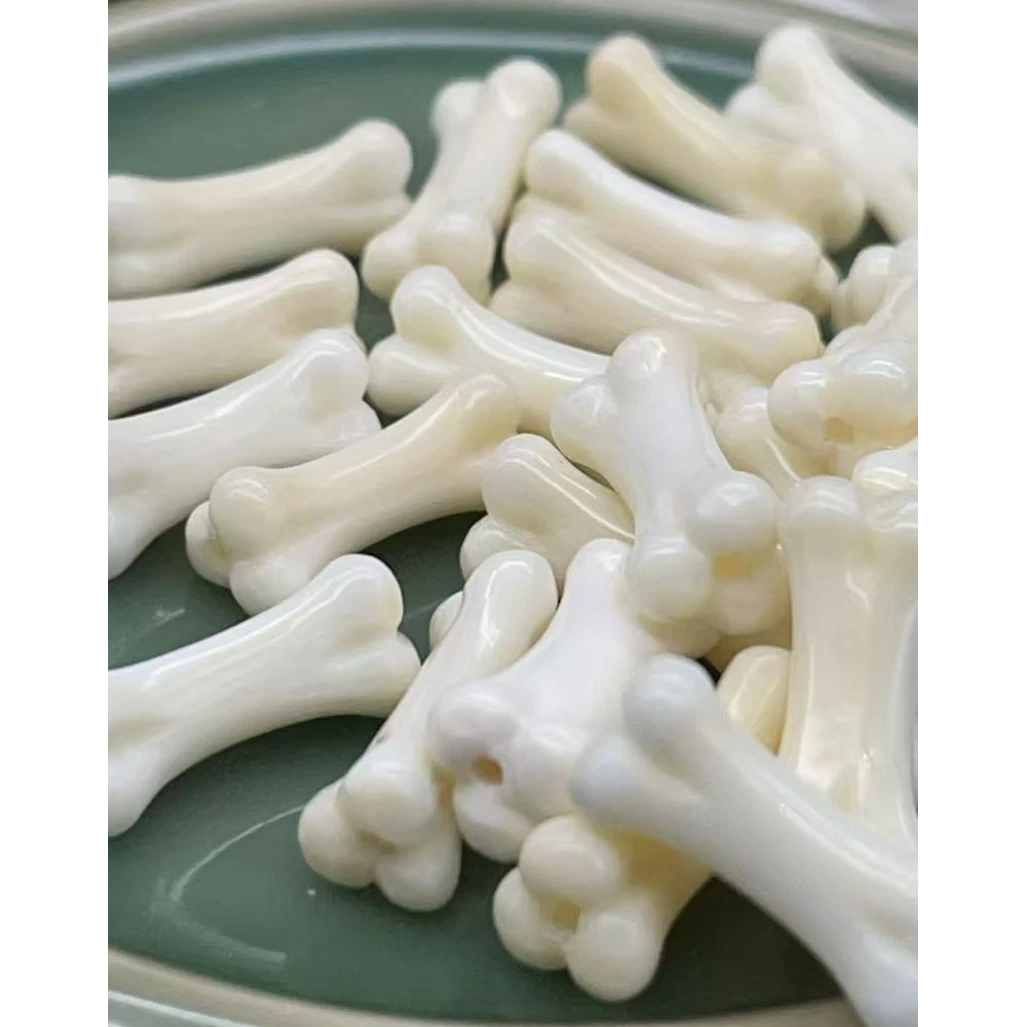 80722精品猛犸象牙13.4*6左右文玩原色小骨头配饰（有水印发其一）