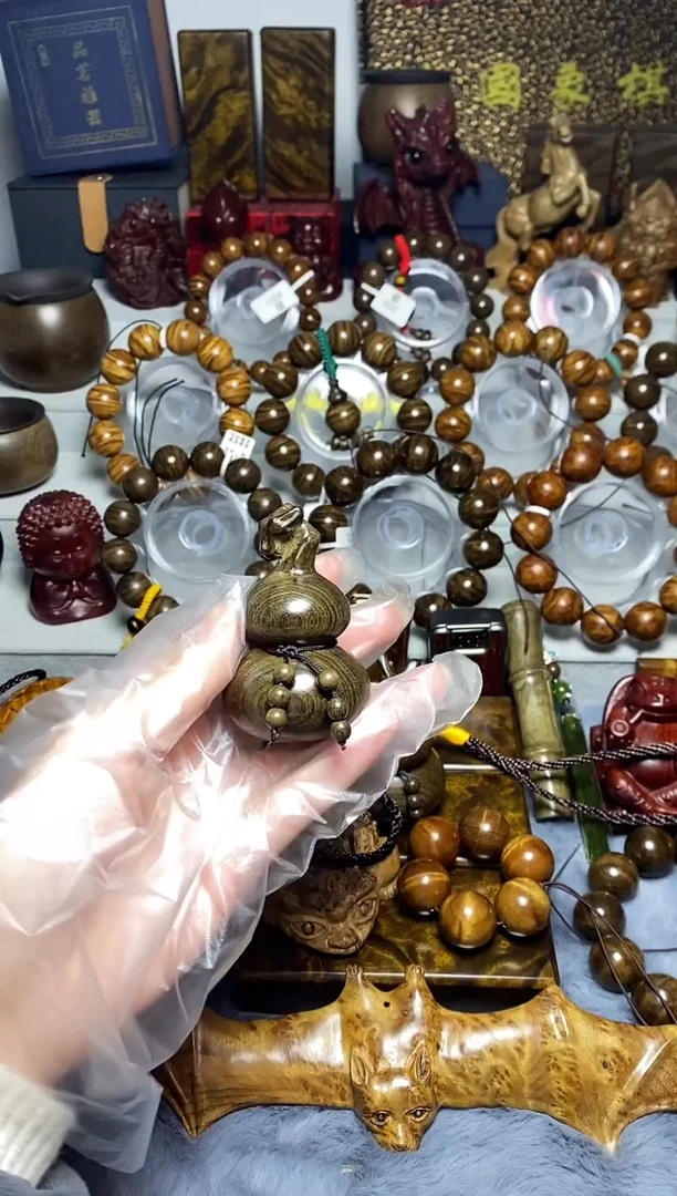 阴沉木龙头葫芦手把件