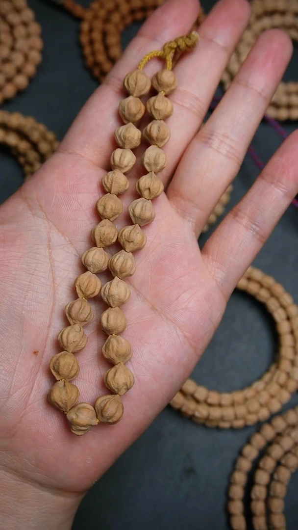 柏香籽/百香籽吊坠手持