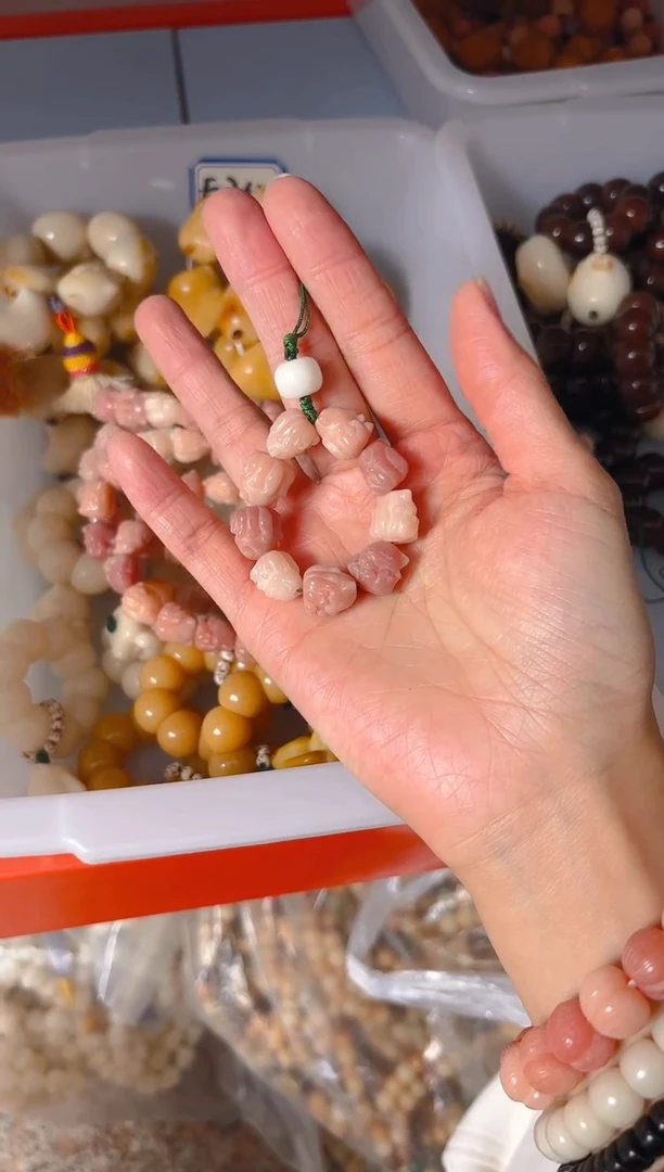 吊坠菩提根/象牙果粉色凤九手机链