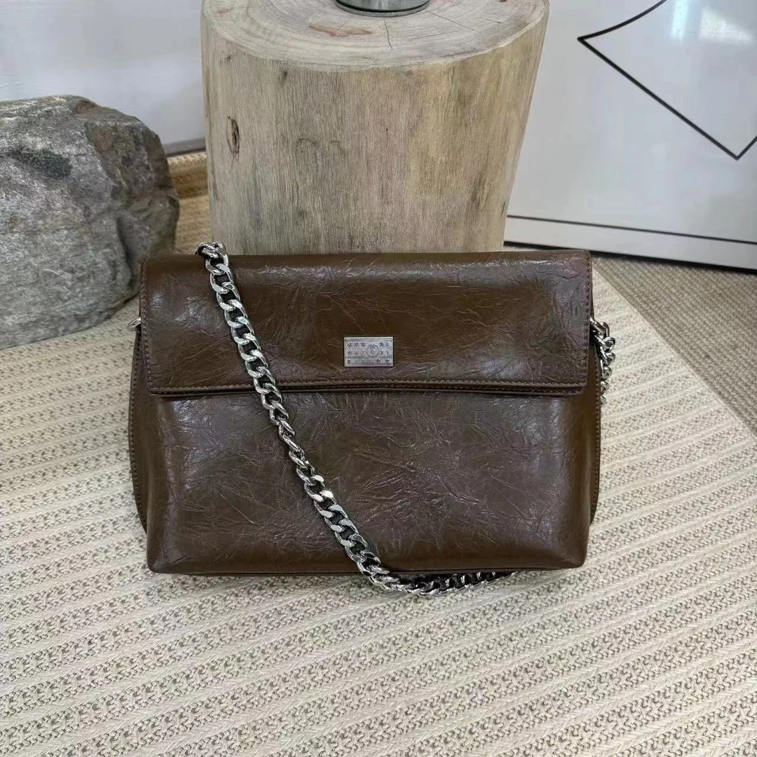 【芝麻集】QYX-9598-摩卡色RAIN.CUN夏季新款腋下斜跨轻奢女包