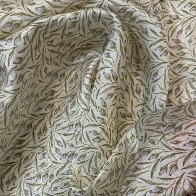 面料透的【杏底小碎花珠光纱】面料轻薄柔软，可做衬衣，连衣裙等