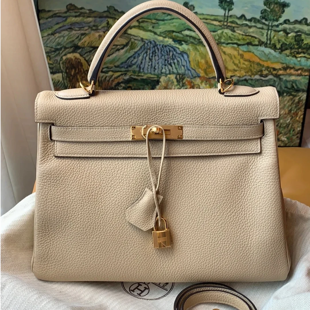 99新 Hermes/爱马仕 小花Jerry Kelly 32 风衣灰 金扣 X刻包