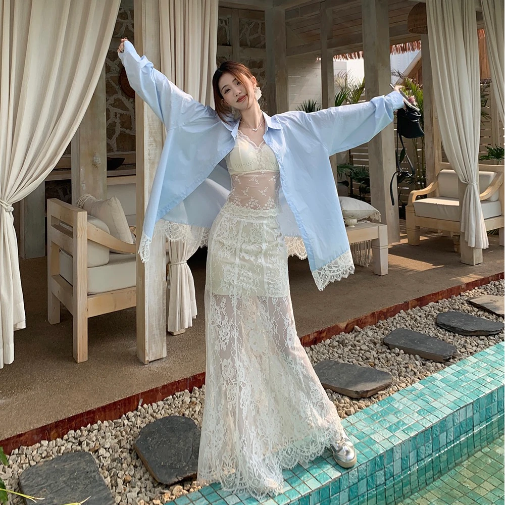 蕾丝拼接宽松长袖衬衫女2025春季新款polo领设计感度假风小众上衣