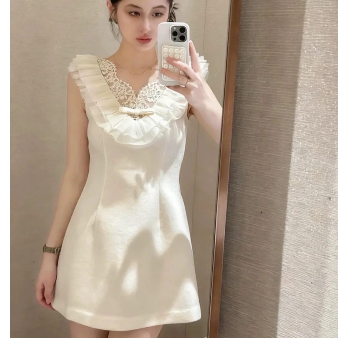 温柔风减龄两件套装2025冬季新款洋气针织衫荷叶边毛呢背心连衣裙