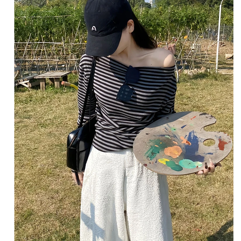 辣妹露肩条纹长袖t恤女2025早春季新款时尚洋气修身一字斜肩上衣