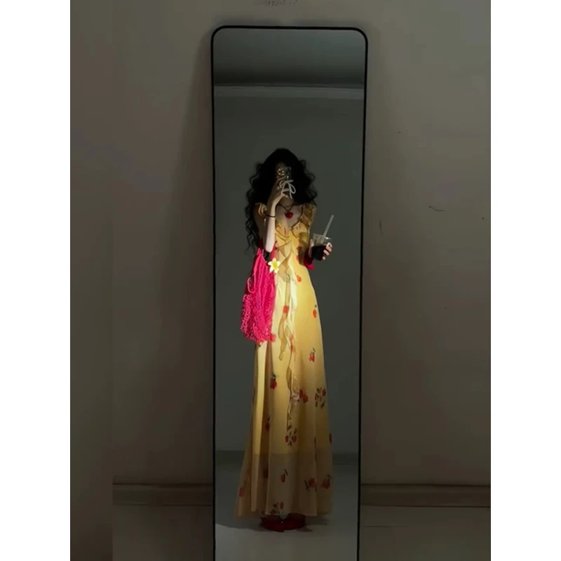 法式木耳边V领吊带连衣裙女春夏季气质海边度假无袖碎花收腰长裙