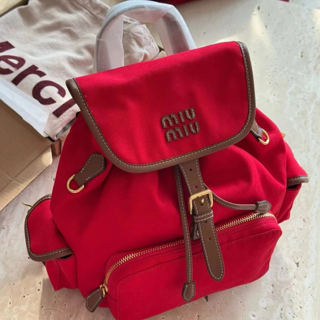 95新 MIU MIU/缪缪 红色大号双肩包  19035429