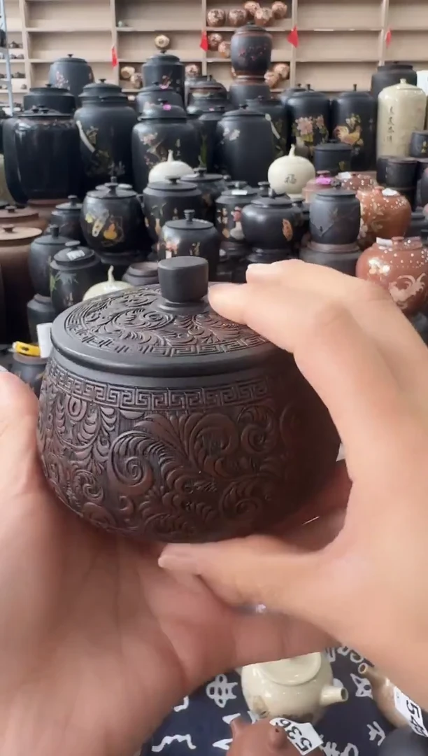 壶瑕疵茶叶罐  818   50克满雕凤凰花