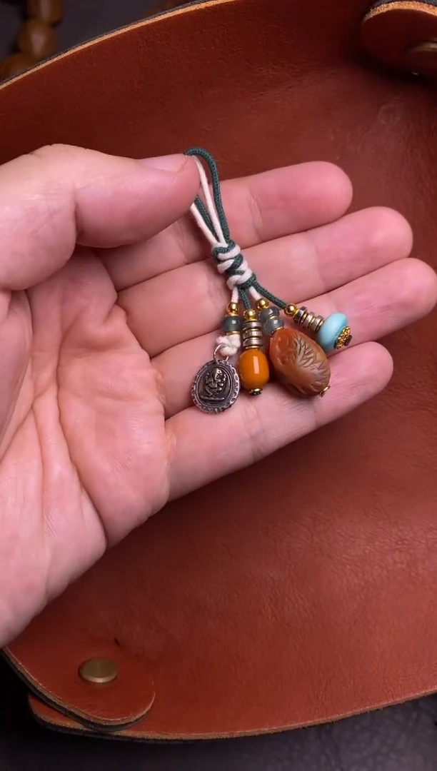 未镶嵌绿松石颈饰四出弟子珠