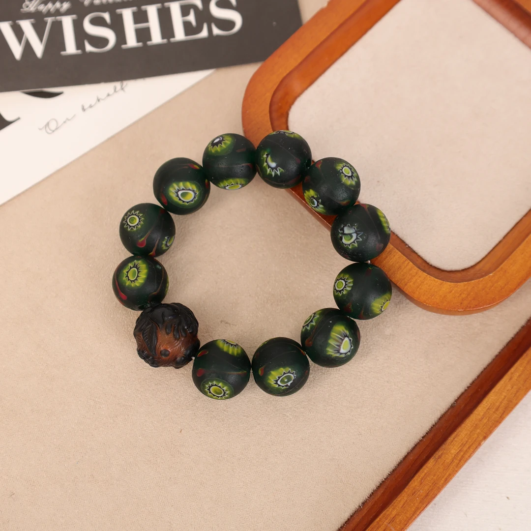 合金手链 LZ2616 黑色雕刻珠磨砂凤眼琉璃手链 雕刻图案随机