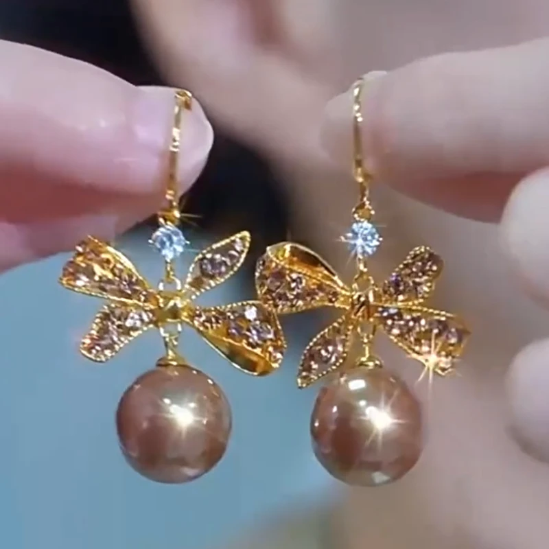 合金仿珍珠耳饰 蝴蝶结珍珠耳环女轻奢小众设计高级感气质耳饰品