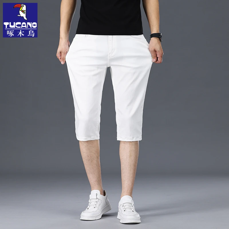啄木鸟短裤男款夏季新款纯白牛仔七分弹力修身直筒百搭休闲牛仔裤
