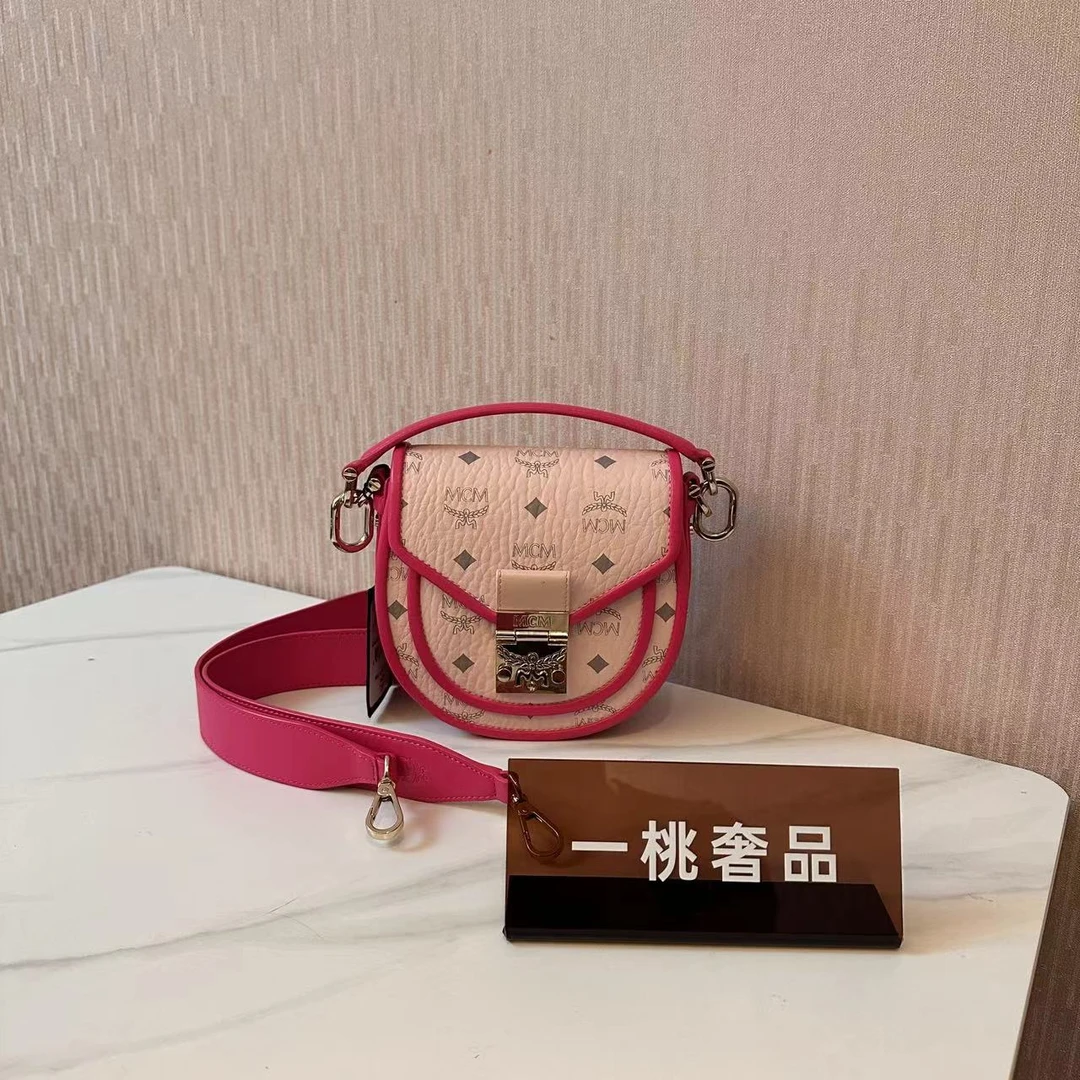 95新 MCM 一桃/实际98新/MCM 马鞍手提斜挎