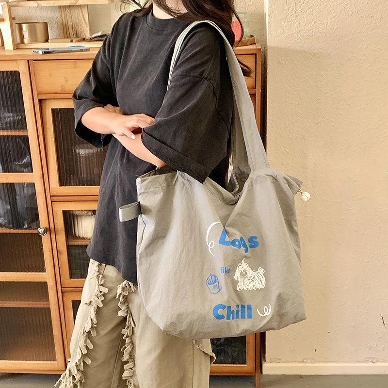 慵懒风刺绣帆布包包2024新款朝韩托特包学生上课大容量购物袋