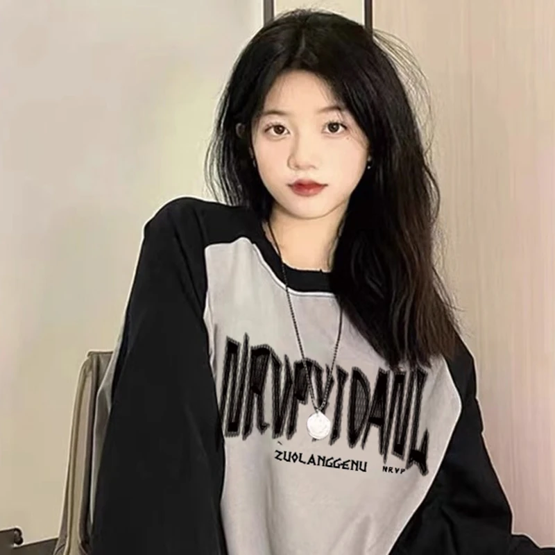 佐朗格奴/纯棉秋冬新款设计感个性宽松上衣插肩袖撞色长袖t恤衫女