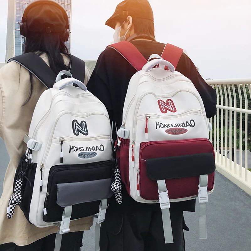 书包女大容量休闲中学生双肩包港风潮酷大学生轻便旅行双肩背包男