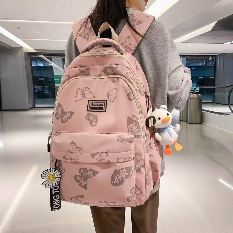 书包女印花可爱双肩包小学生初中高中生上课背可爱简单韩版学院风