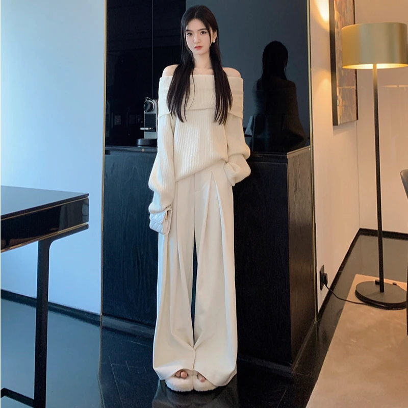 慵懒风软糯一字肩白色毛衣女秋冬季露肩大翻领纽扣宽松针织衫上衣