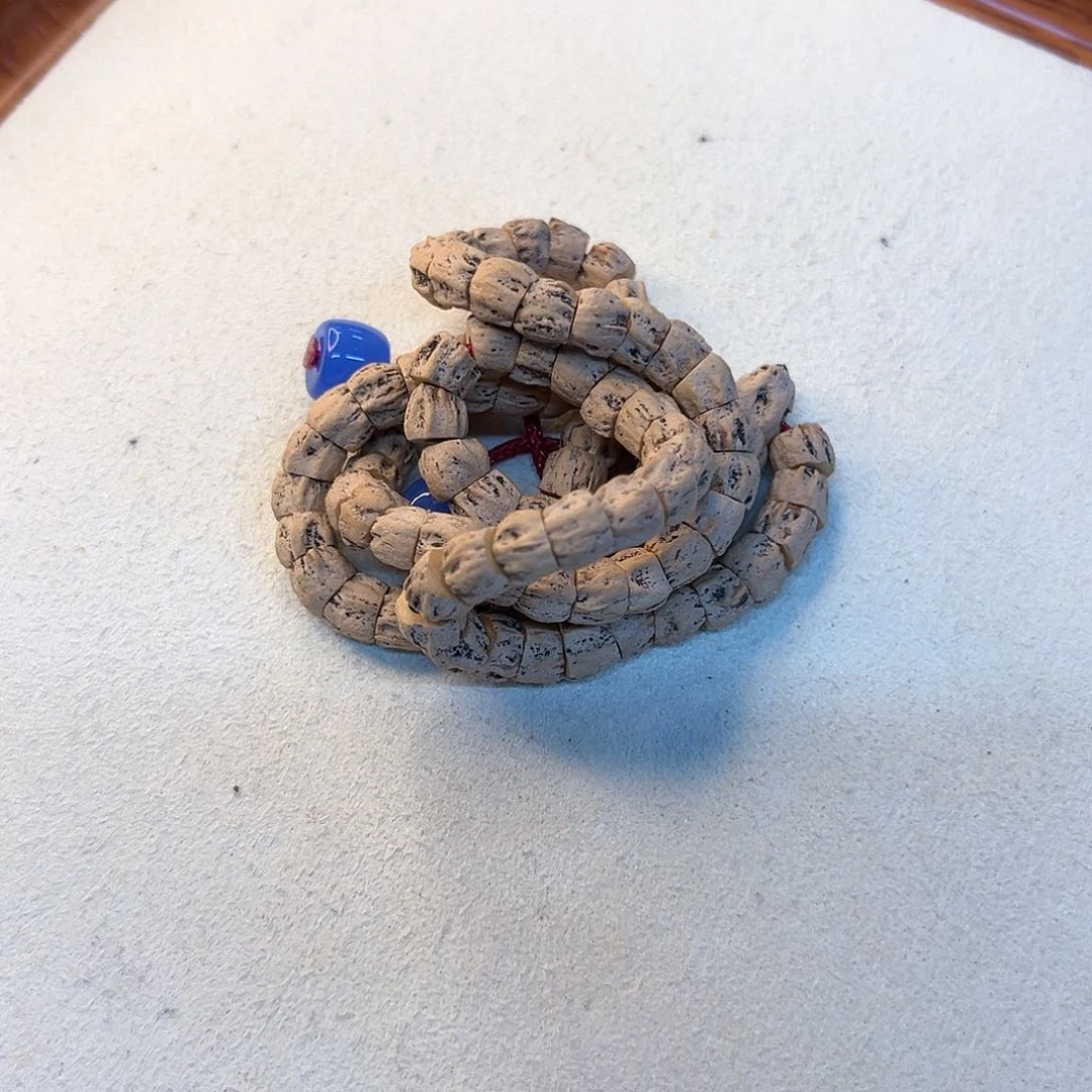 柏香籽/百香籽吊坠-鬼吻断肠手持