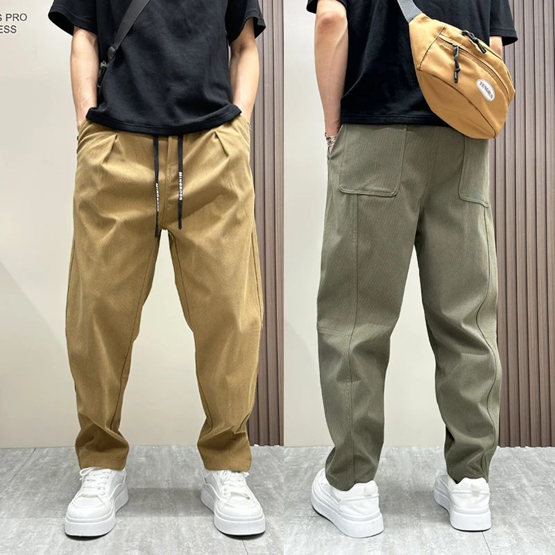 裤子男秋冬新款直筒休闲裤设计感潮牌哈伦裤松紧腰男士锥型小脚裤