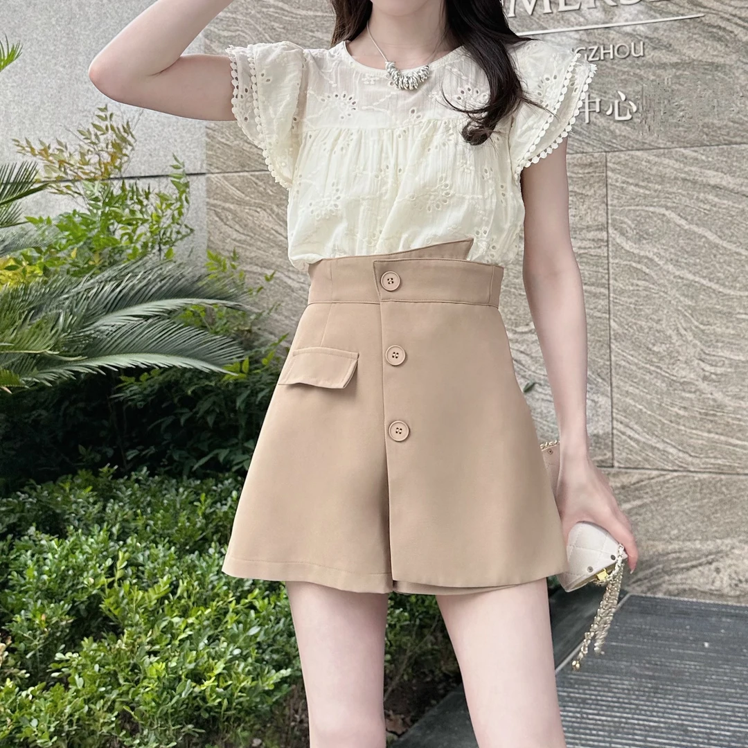 DK0304三粒扣高腰A字不规则短裤