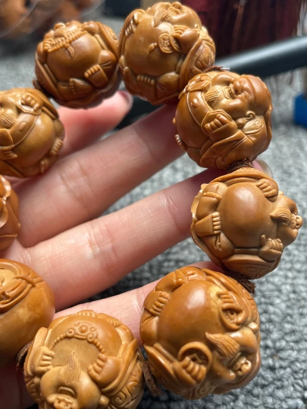橄榄核雕荷叶横财手串手链尺码宽2.4高度2.5左右