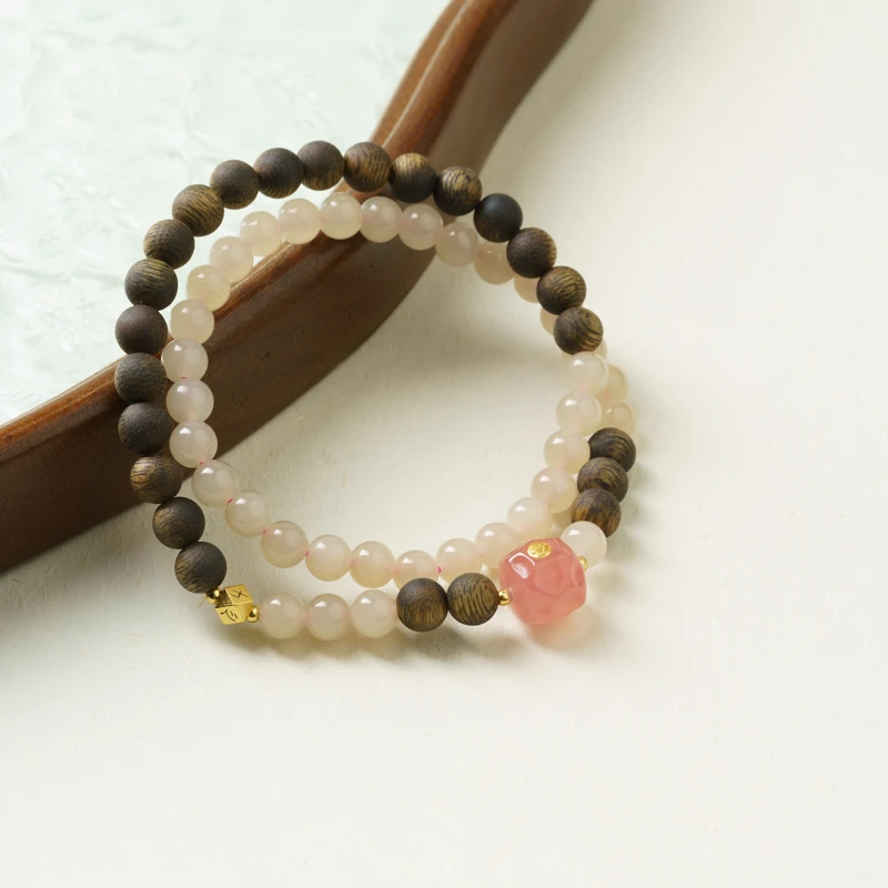 【柏林少女】奇楠沉香0.6藕粉双圈手串