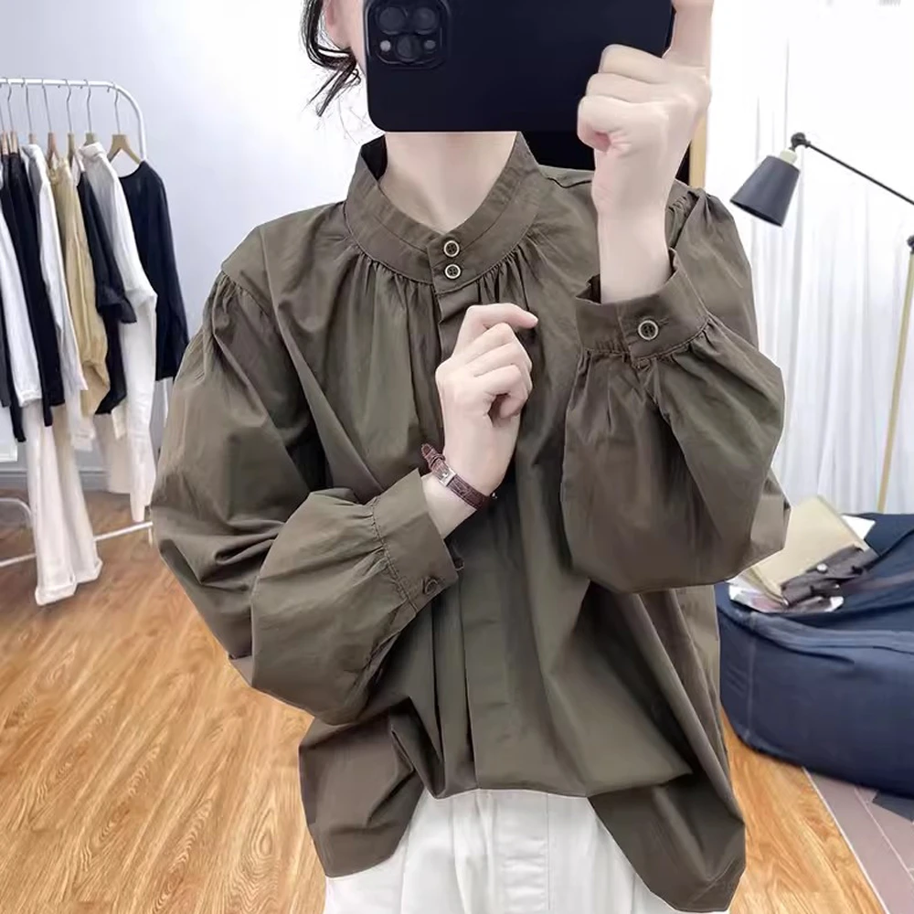 秋装文艺复古立领小黑扣灯笼袖长袖衬衫女式2025新款港风宽松衬衣