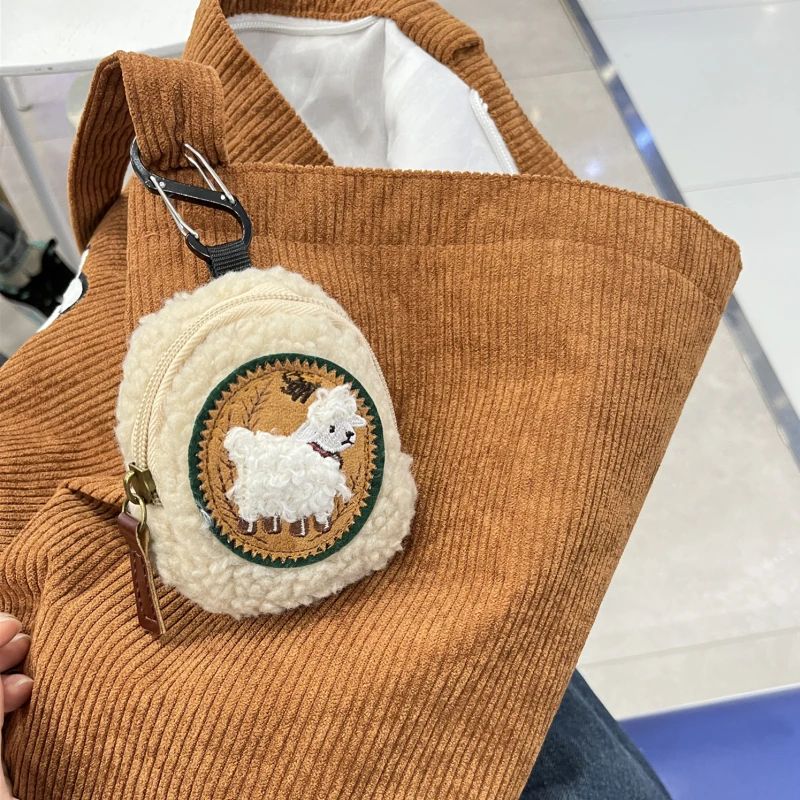 小羊羔毛绒耳机包高颜值零钱收纳小包便携包包挂件可爱迷你口红包