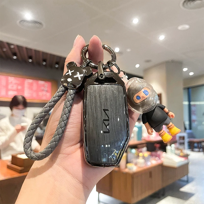 起亚狮铂拓界钥匙套智跑k5赛图斯k3傲跑kx3奕跑kx5车kx1男女壳扣