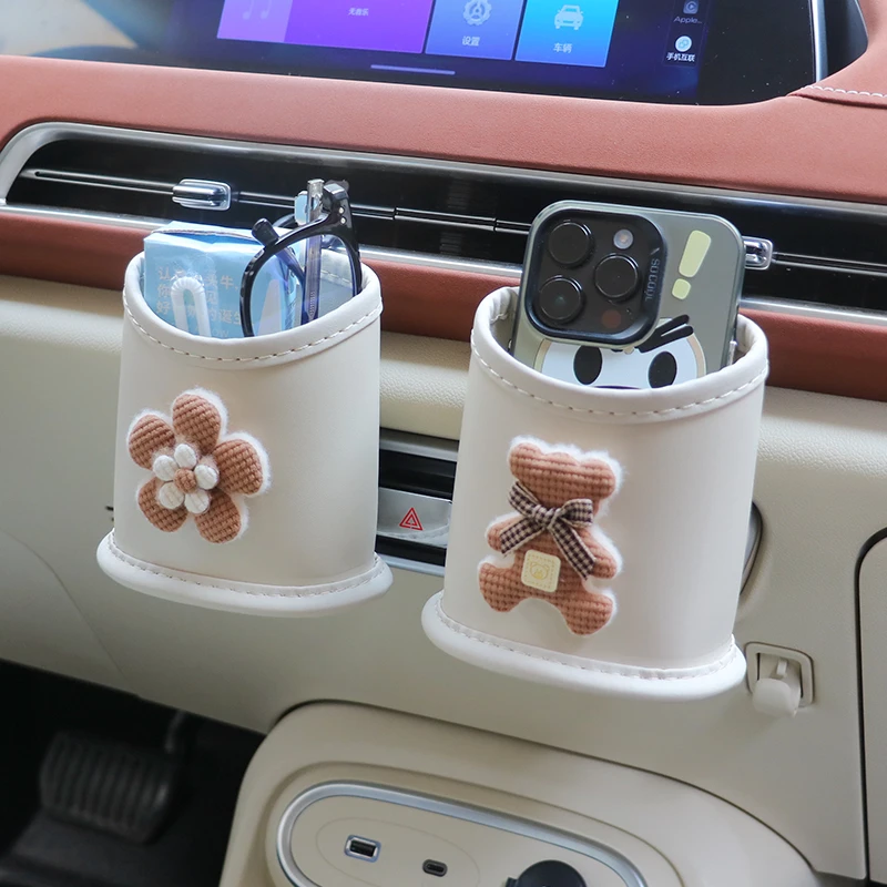 汽车出风口挂式置物盒收纳桶女生实用副驾驶垃圾桶卡通创意皮革桶