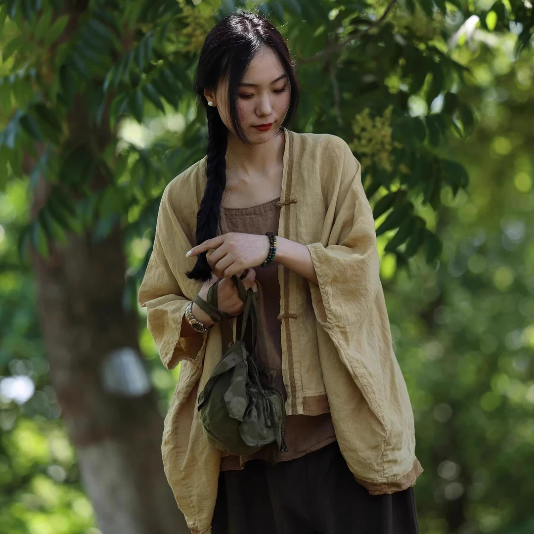 彭彭家 37724 麻手工盘扣复古外披开衫 衣路走来