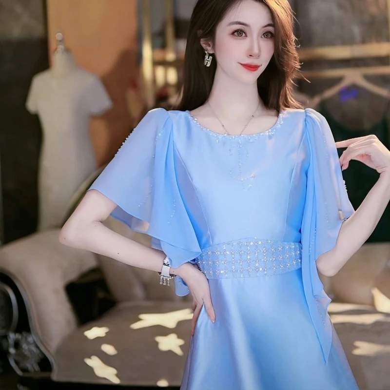 SEJI/瑟纪蔚蓝海岸重工气质连衣裙