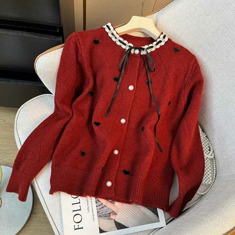 甜美蕾丝边菱形格爱心针织衫女冬季2025新款学院风蝴蝶结系带毛衣